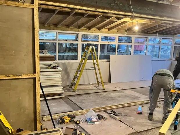 Ceiling joists exposed and props in place during structural alterations to a Caerphilly home